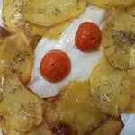 Ricetta Filetto d’orata con pomodorini in crosta di patate