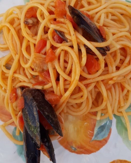 Spaghetti con cozze e pomodorini