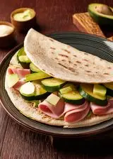 Ricetta Piadina integrale con zucchine e prosciutto cotto