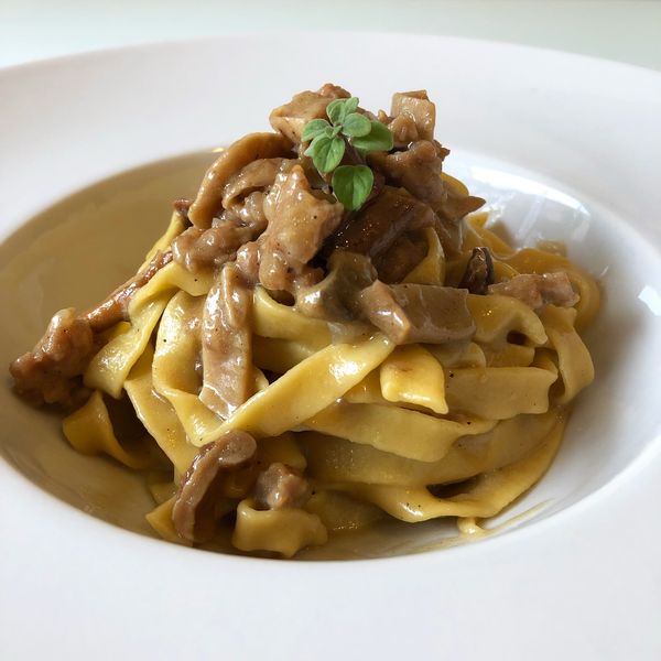 Tagliatelle porcini, salsiccia e parmigiano. Al.Ta Cucina