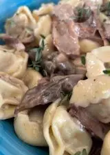 Ricetta Tortellini di carne brasata, porcini, crema di parmigiano, timo