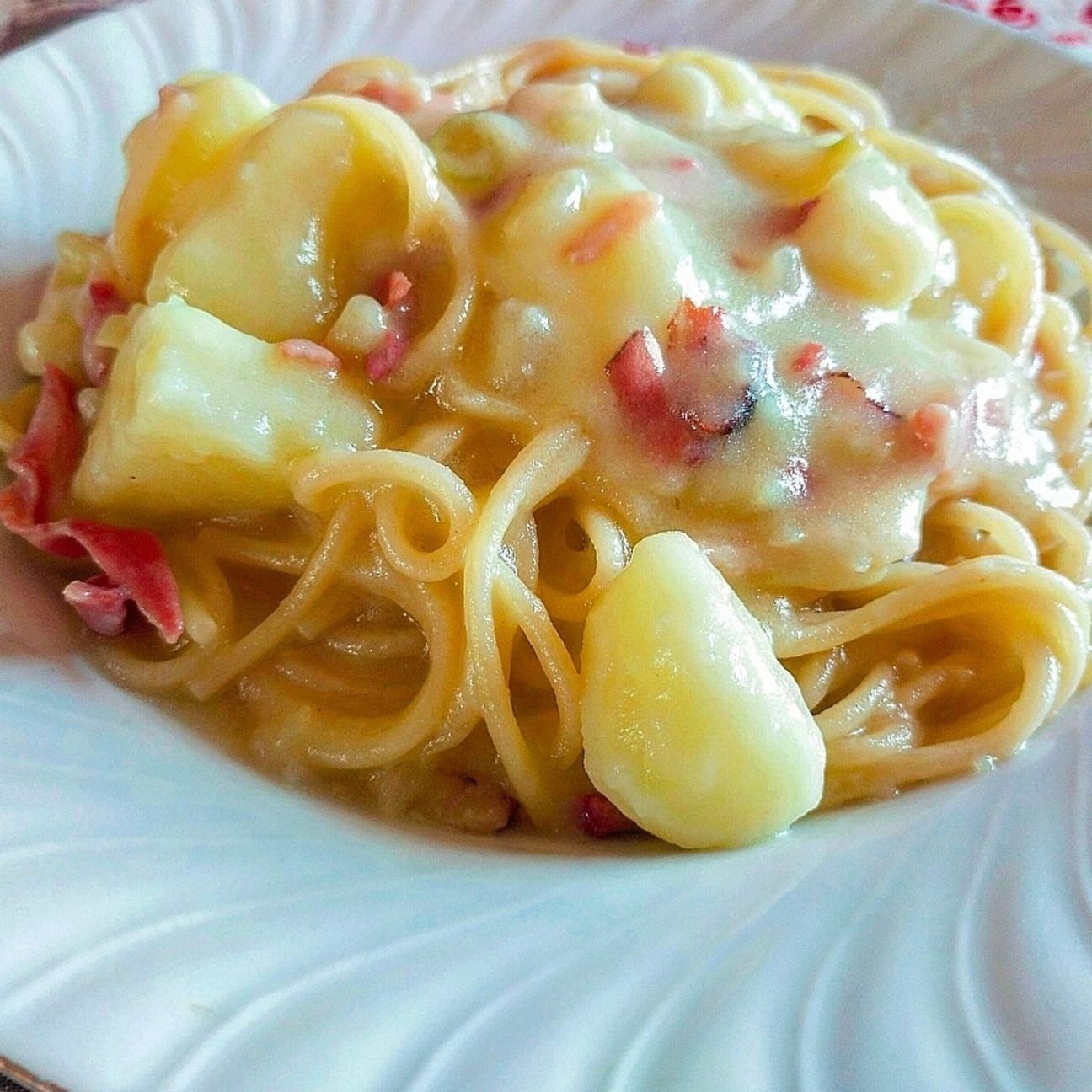 Pasta patate speck e cipollotto fresco