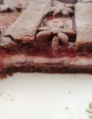 Ricetta Costata al cacao con confettura di ciliegie e ricotta 😋 di Manuxskitchen