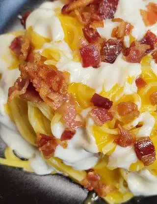 Ricetta TAGLIOLINI CON CREMA DI ZUCCA, FONDUTA E PANCETTA di FraiFornelli