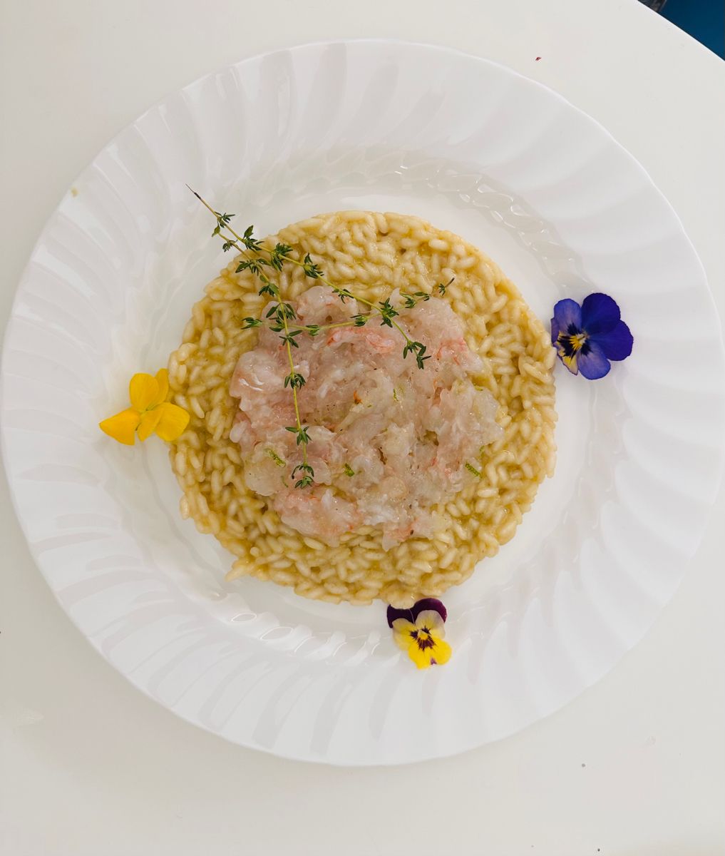 Risotto Carnaroli mantecato al limone con battuta di scampi