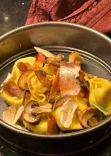 Ricetta Tortelloni ai funghi porcini con guanciale, castagne profumate al rosmarino e funghi porcini