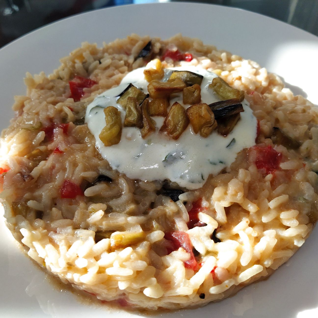 Risotto con melanzane e crema allo yogurt