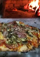 Ricetta Pizza nel forno a legna