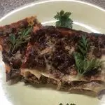 Ricetta Lasagna con crema di carciofi e salsiccia