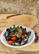 Ricetta Cozze pomodorini e prezzemolo