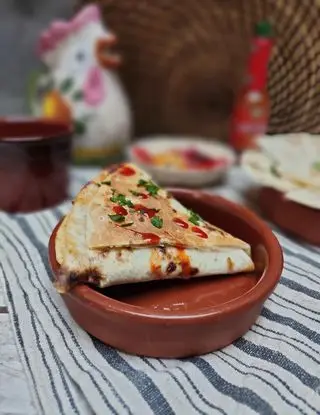 Ricetta Triangoli di tortillas ripieni di _paola_catalano