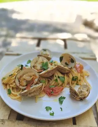 Ricetta Spaghetti con tartufi di mare e pomodori di _paola_catalano