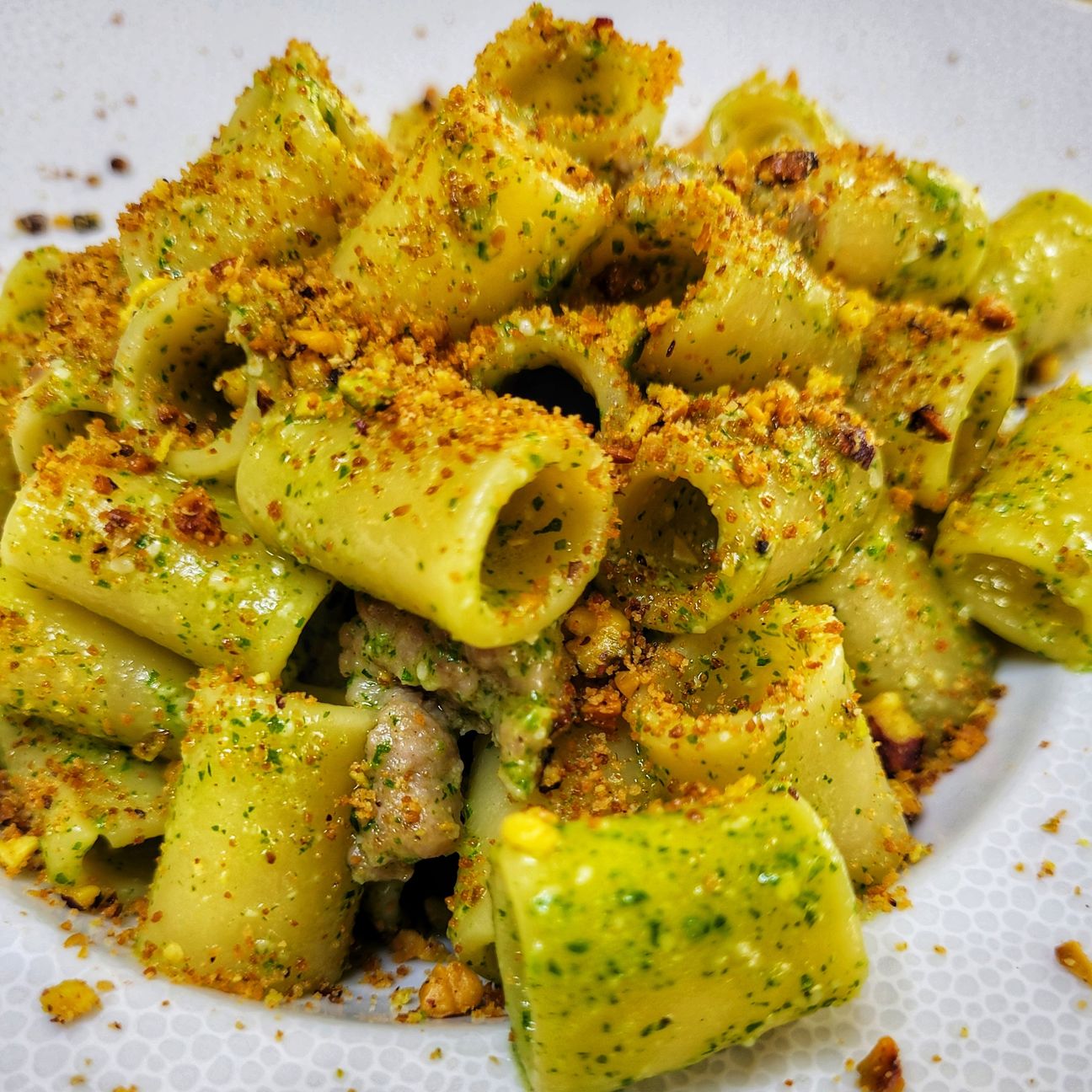 Occhi di lupo pesto di rucola e salsiccia