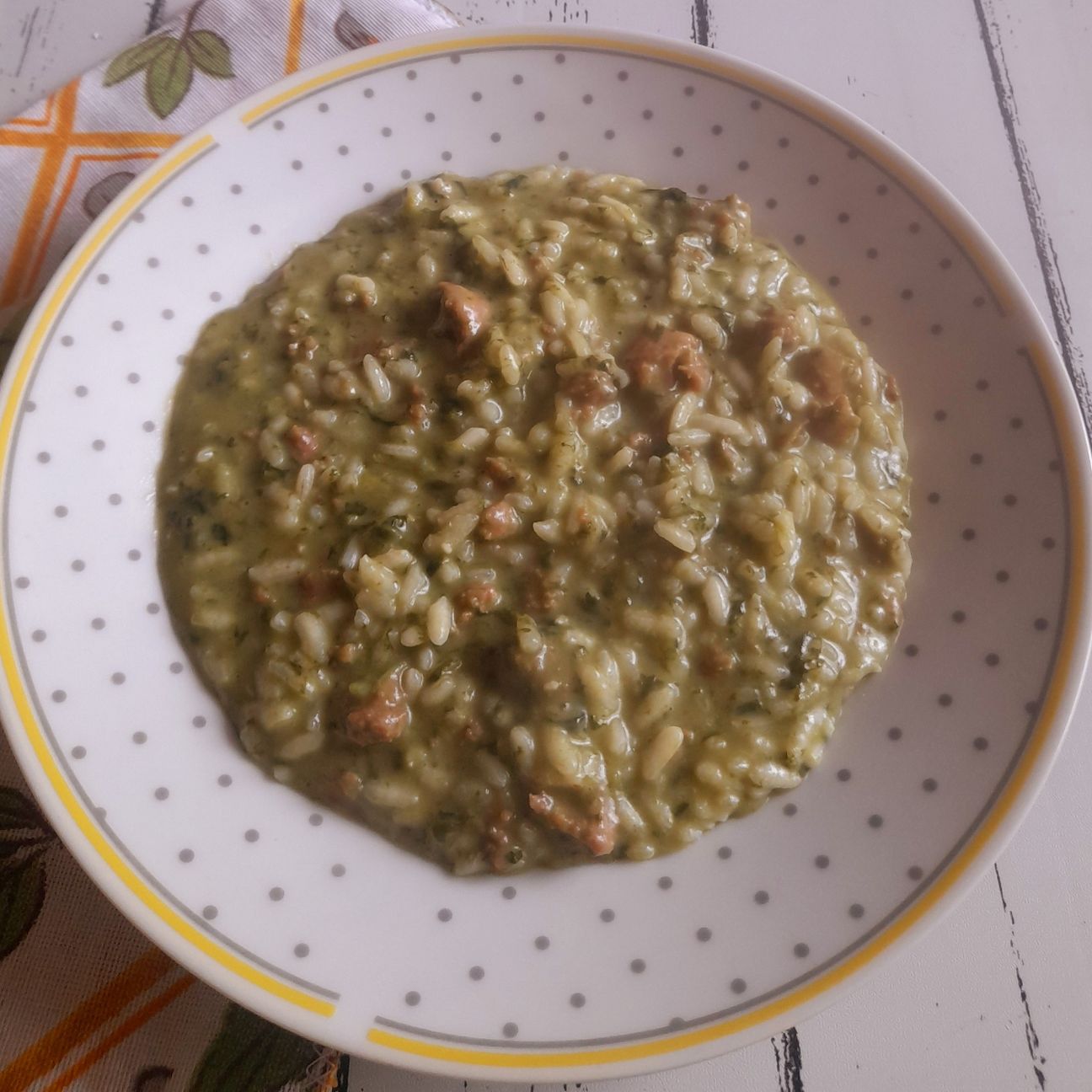 Risotto con salsiccia e spinaci