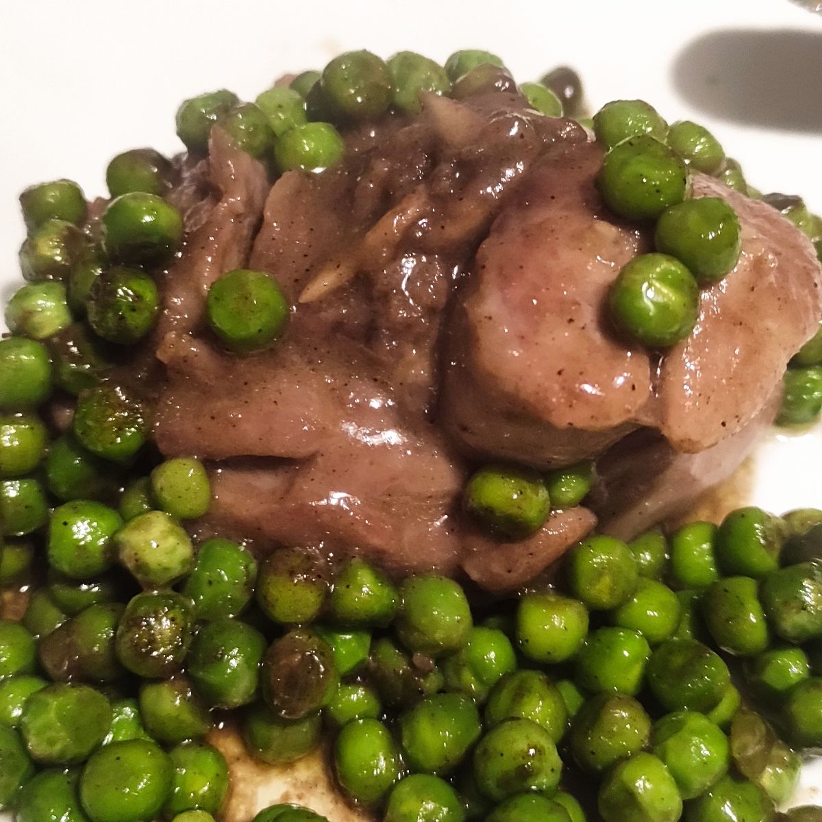 Ossobuco con piselli