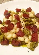 Ricetta Chicche di patate con tonno rosso in salsa di soia, pesto alla genovese e polvere di liquirizia