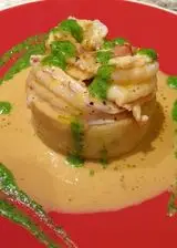 Ricetta Tortino di patate speziate su bisque di mare con gamberoni scottati e maionese di basilico