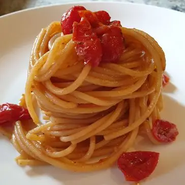 Ricetta Spaghetti bottarga e datterini piastrati di Robertobabbilonia