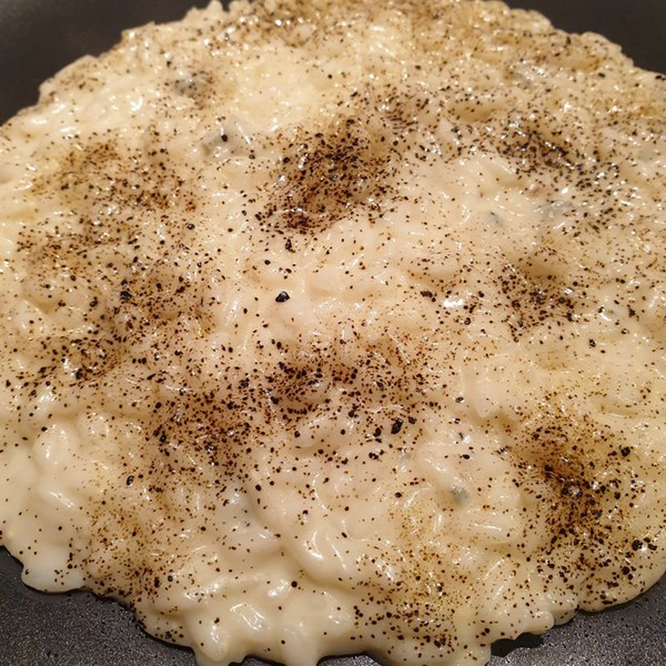 Risotto al gorgonzola e polvere di liquirizia