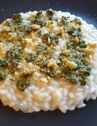 Ricetta Risotto al melone giallo con battuto di capperi, prezzemolo e taralli sbriciolati di robertobabbilonia