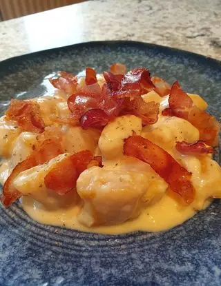 Ricetta Gnocchi di zucca in crema di taleggio al tuorlo con speck croccante e profumo di rosmarino di robertobabbilonia