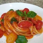 Ricetta Spaghettoni Garofalo XXL ai tre pomodori e basilico fresco