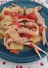 Ricetta Calamarata con sugo agli scampi