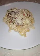 Ricetta Tagliatelle  con crema  di parmigiano 24 mesi e Speck croccante