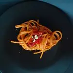 Ricetta Spaghetti con crema di peperoni, curcuma e mandorle