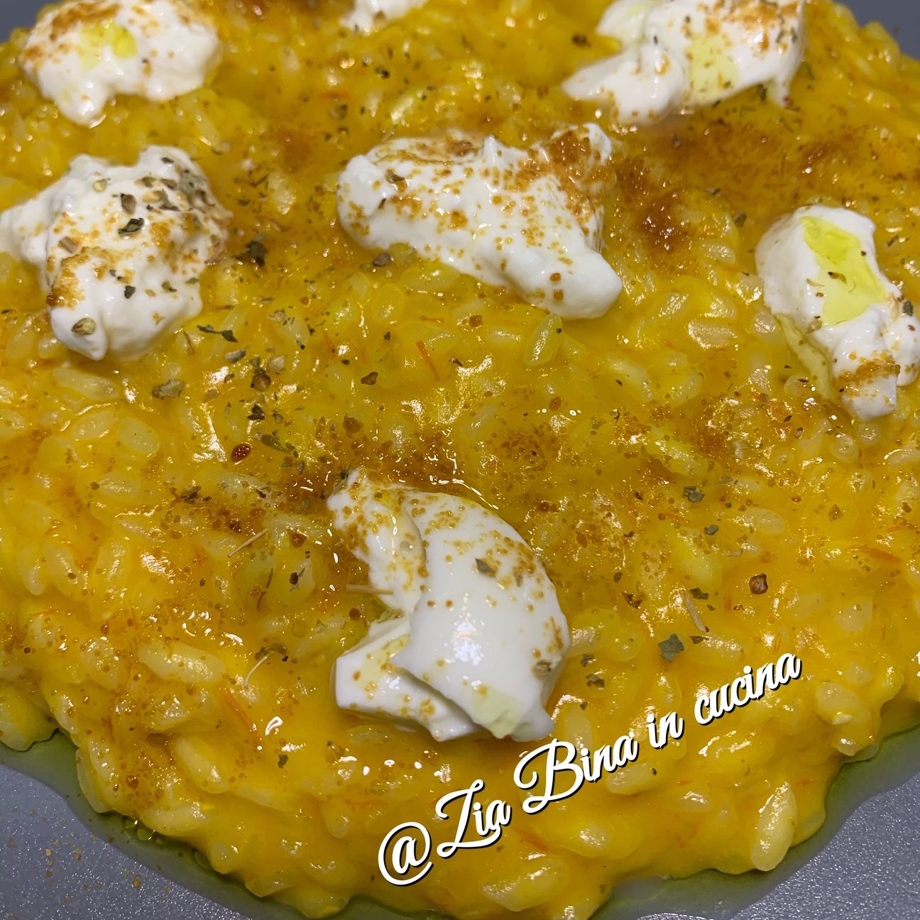Risotto con coulis di pomodorini, burrata e bottarga