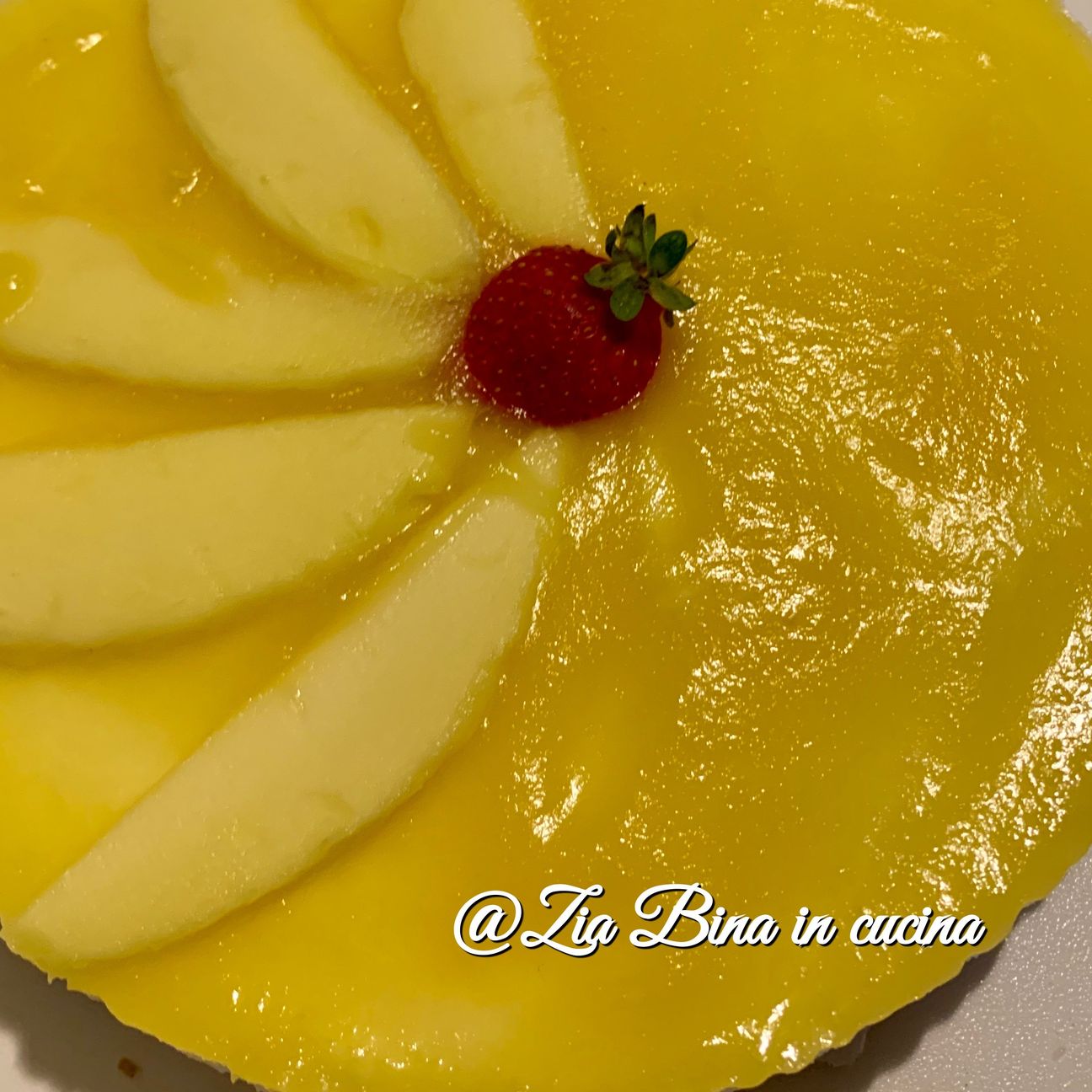 Cheesecake con culis al mango