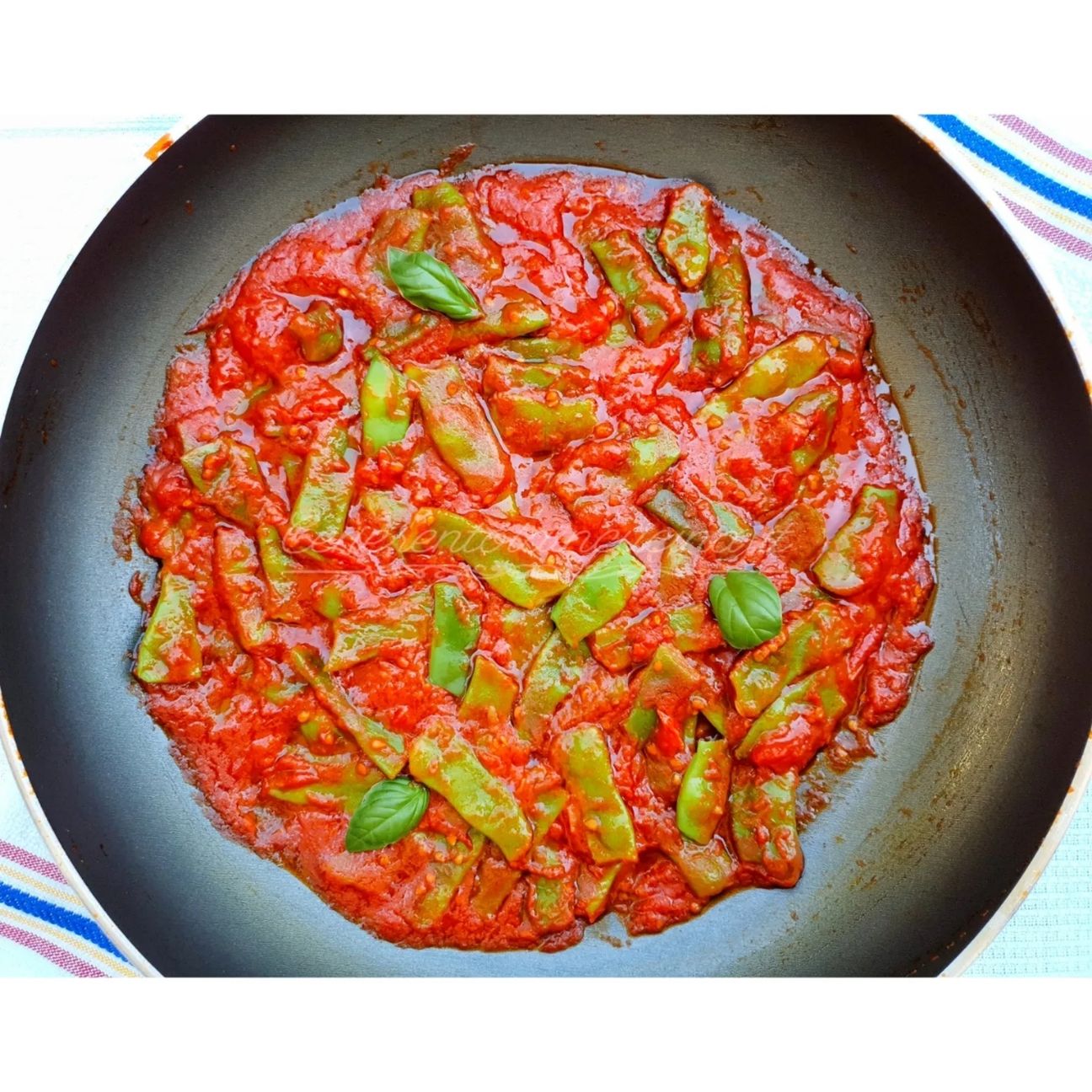 Fusilli con fagiolini e pomodorini.
