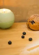 Ricetta Muffin al cuore di mirtillo con scaglie di cioccolato e pistacchi