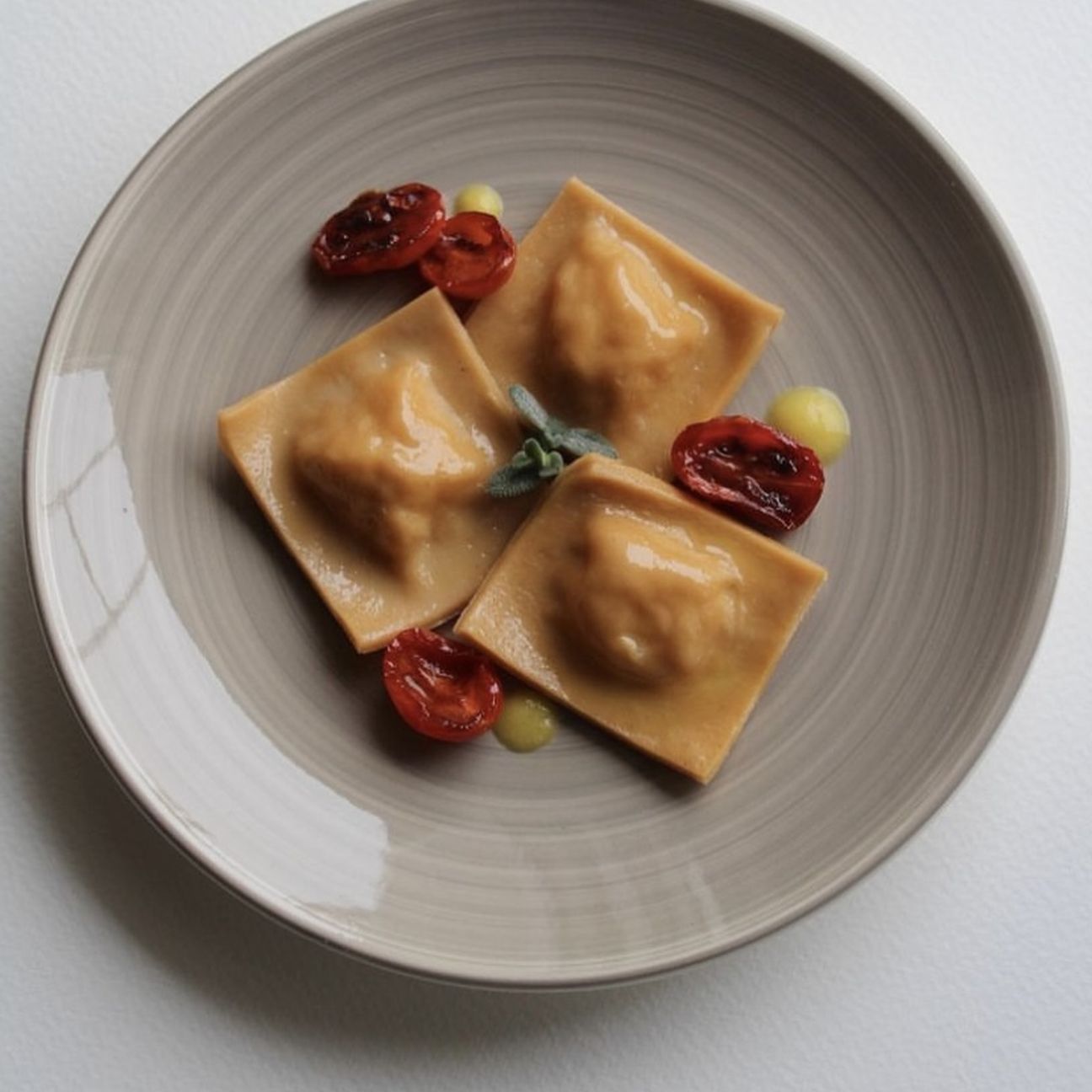 Ravioli gamberi e cipollotto