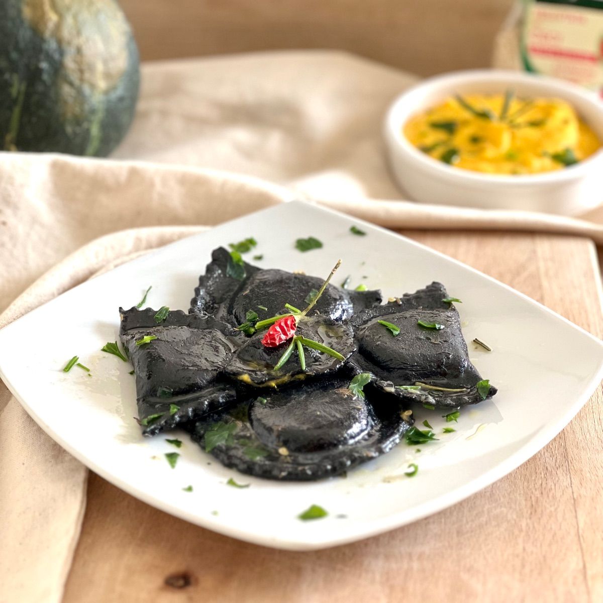 RAVIOLI NERO di SEPPIA ripieni di ZUCCA & CECI