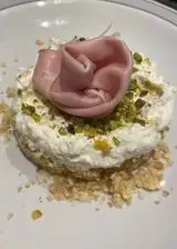 Ricetta Cheesecake salata con mortadella e granella di pistacchio