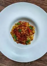 Ricetta Gnocchetti pomodorini, gamberi e speck