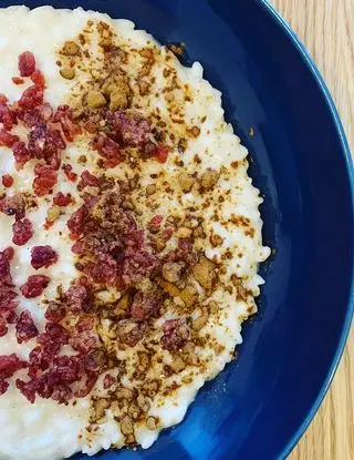 Ricetta Risotto alla parmigiana, cotechino e polvere di liquirizia di boboincucina