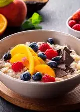 Ricetta Porridge con frutta fresca e cioccolato fondente