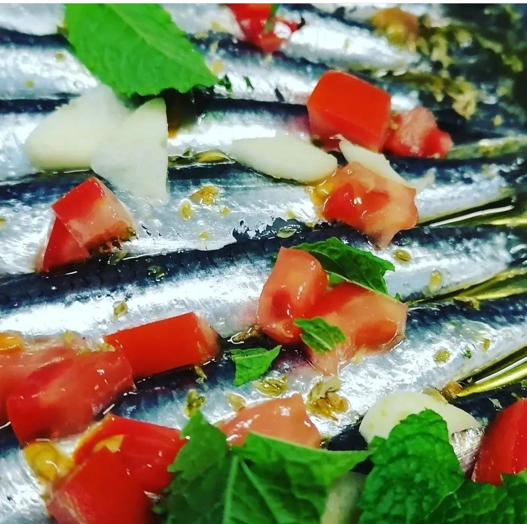 Alici pomodorini aglio e meticcia