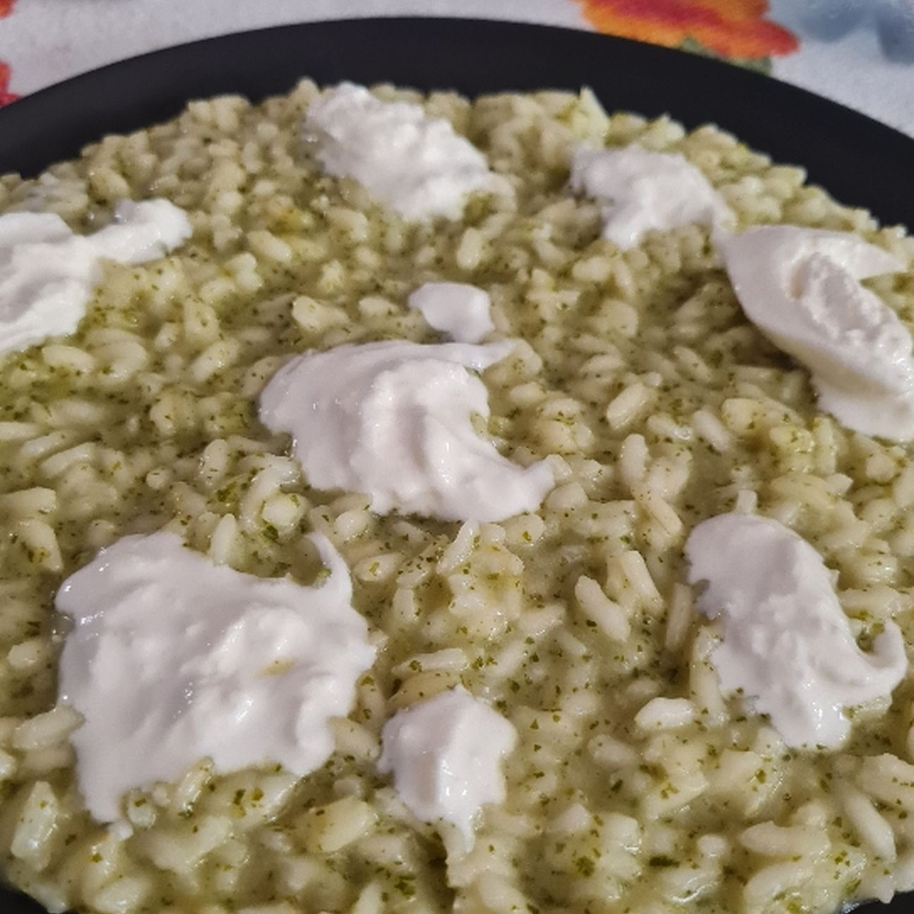Risotto con crema di basilico e burrata
