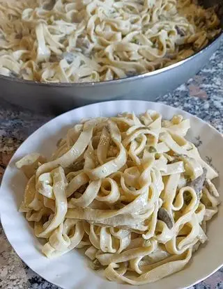 Ricetta Fettuccine con funghi e piselli di limpiattatore