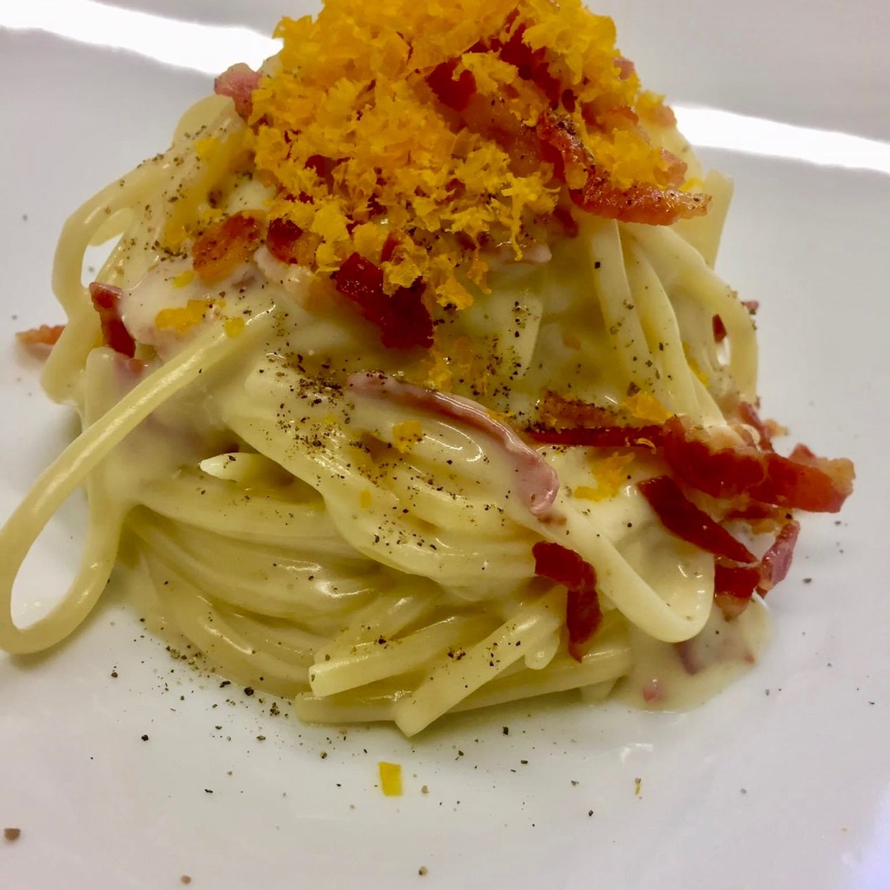 Cacio pepe pancetta bottarga di tuorlo marinato