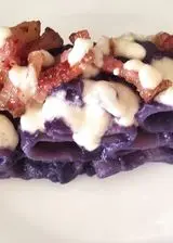 Ricetta Paccheri in crema di cavolo viola con guanciale croccante e fonduta di grana