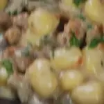 Ricetta Chicche di patate alla fonduta di taleggio con funghi e salsiccia