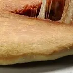 Ricetta Focaccia in padella alla parmigiana di melanzane
