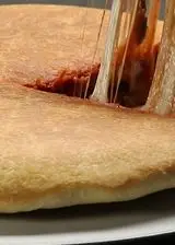 Ricetta Focaccia in padella alla parmigiana di melanzane