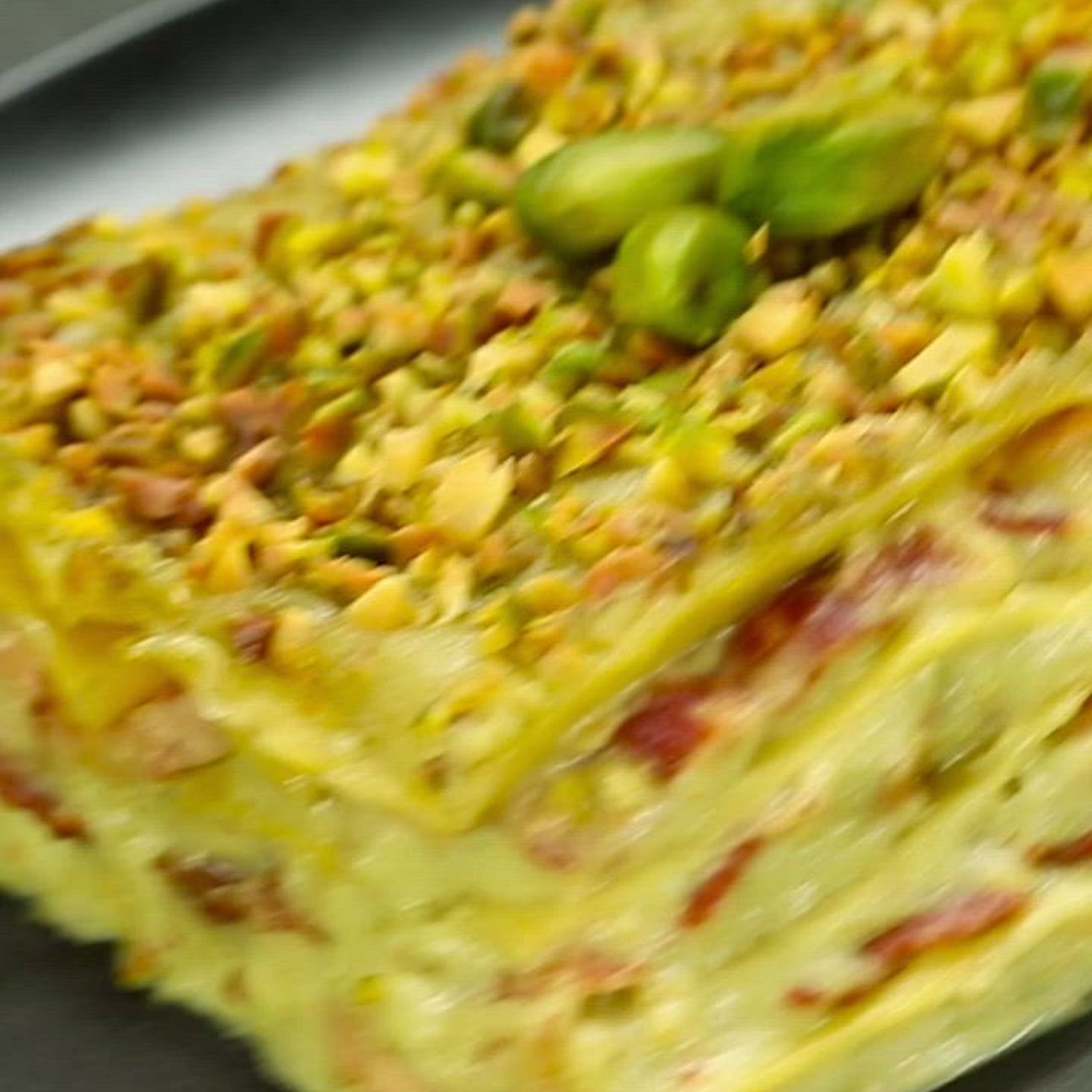 Lasagna al pistacchio con pancetta e provola