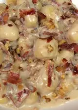 Ricetta Gnocchi con crema di gorgonzola, speck e noci