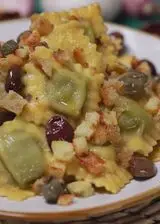 Ricetta Ravioli ricotta e spinaci con alici, olive, capperi e mollica croccante